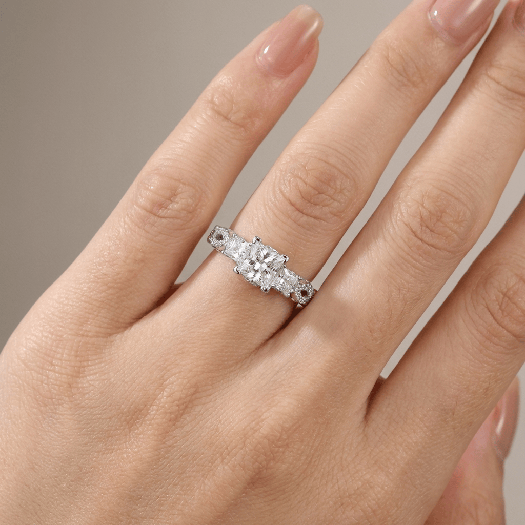 THREE STONE ZIRCONIA SILVER TWIST RING