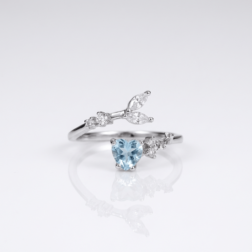 SILVER BLUE TOPAZ SOLITAIRE RING - (ADJUSTABLE)