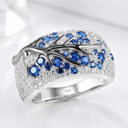 SILVER BLUE TOPAZ LEAF RING