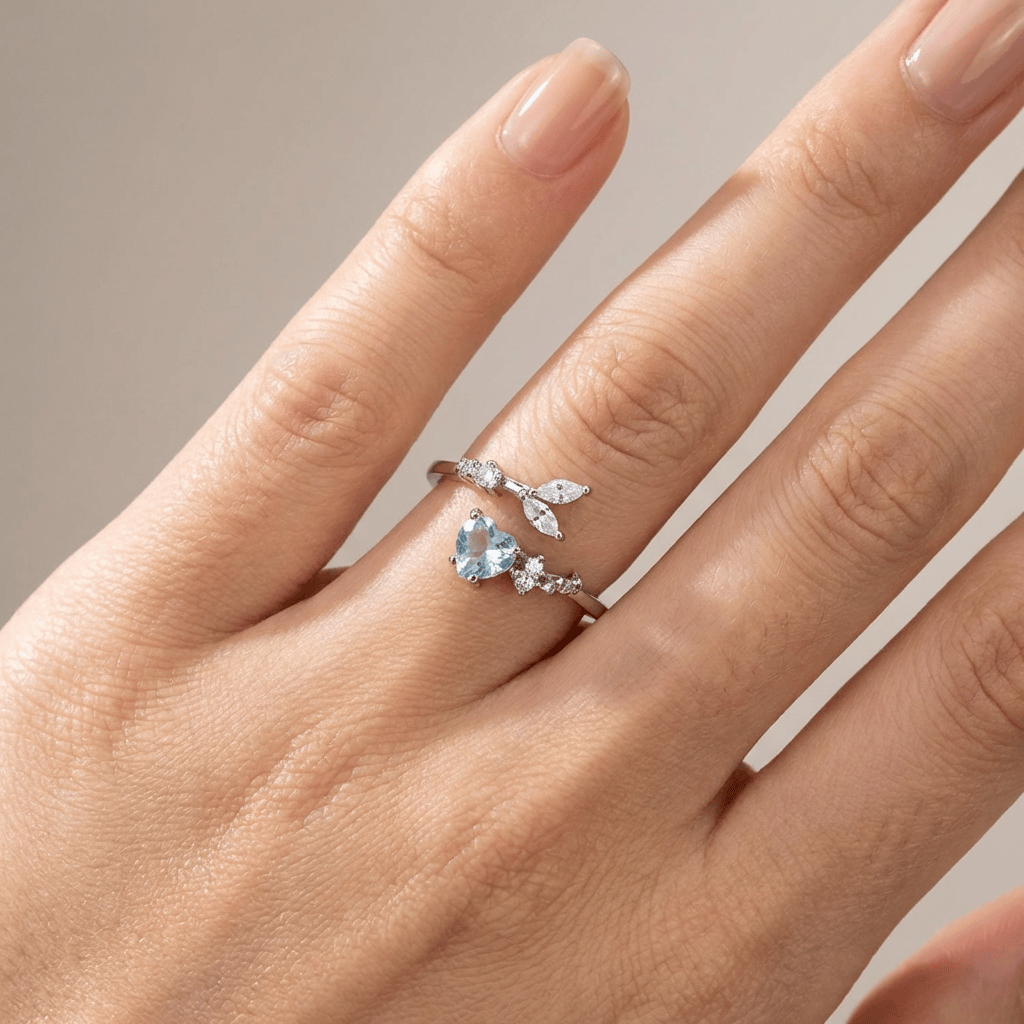 SILVER BLUE TOPAZ SOLITAIRE RING - (ADJUSTABLE)